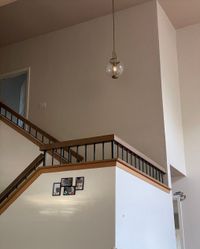 The same stairwell wall finished in one even coat of paint